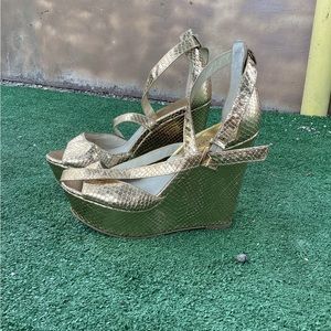 Micheal Kors gold wedges. Sized at 7.5